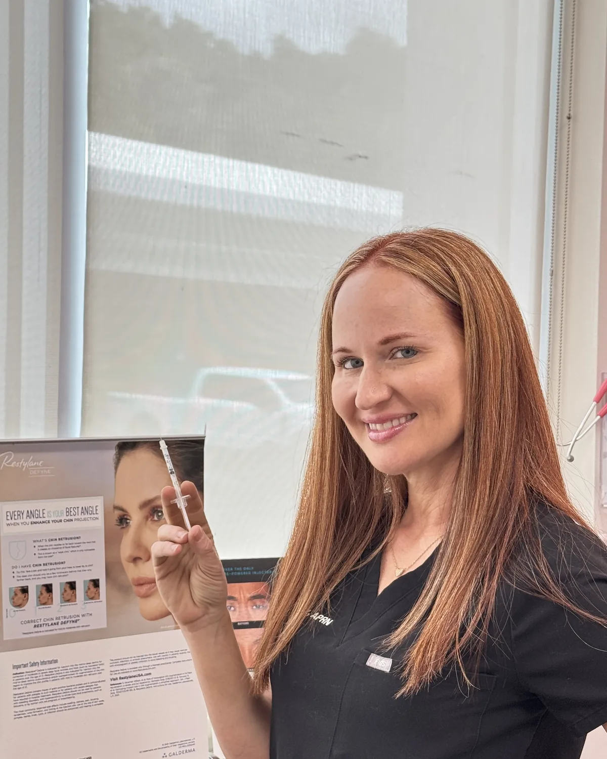Jamie Lobacz, APRN, smiling while talking through a plan at The Ginger Injector, Boca Raton